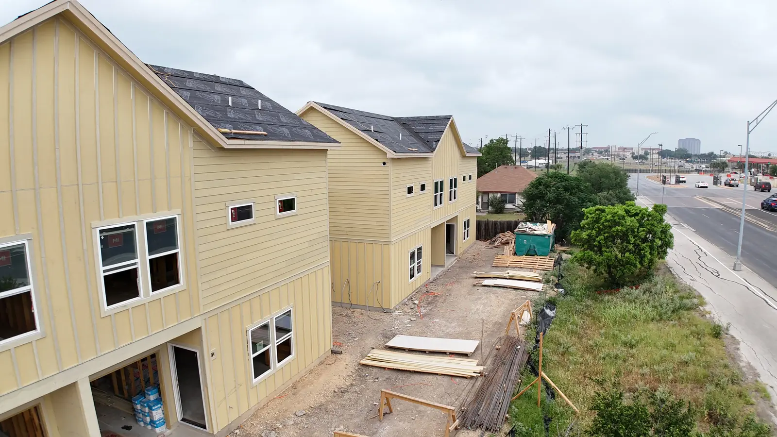 Aerial view of new two-story homes under construction in San Antonio
